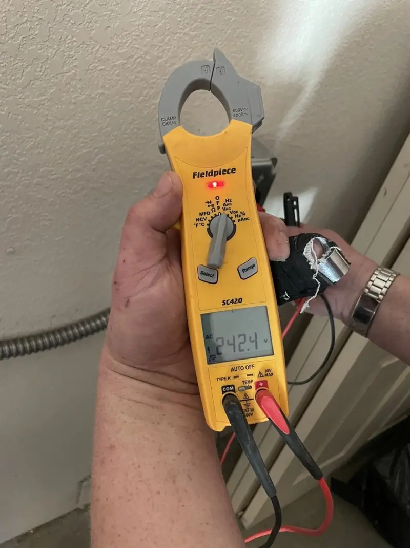 Voltage testing with clamp meter during Electrical Installation Services in Myrtle Beach